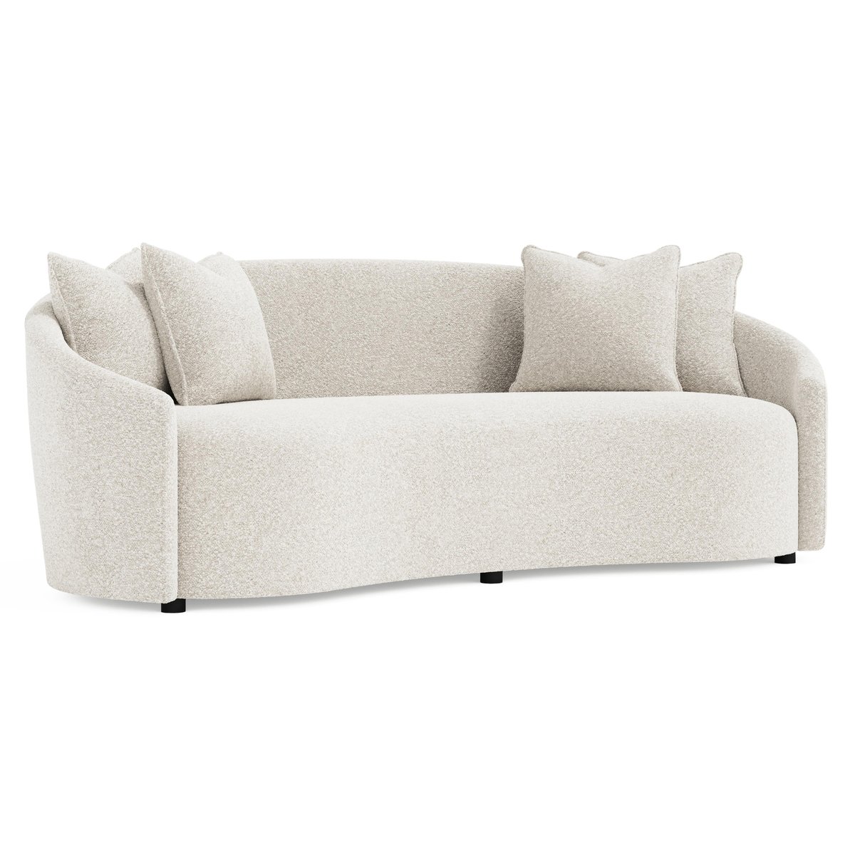 The Bernhardt Lumen sofa, a kidney-shaped curved sofa in off-white bouclé with a tight back, one long bench cushion, and four throw pillows.