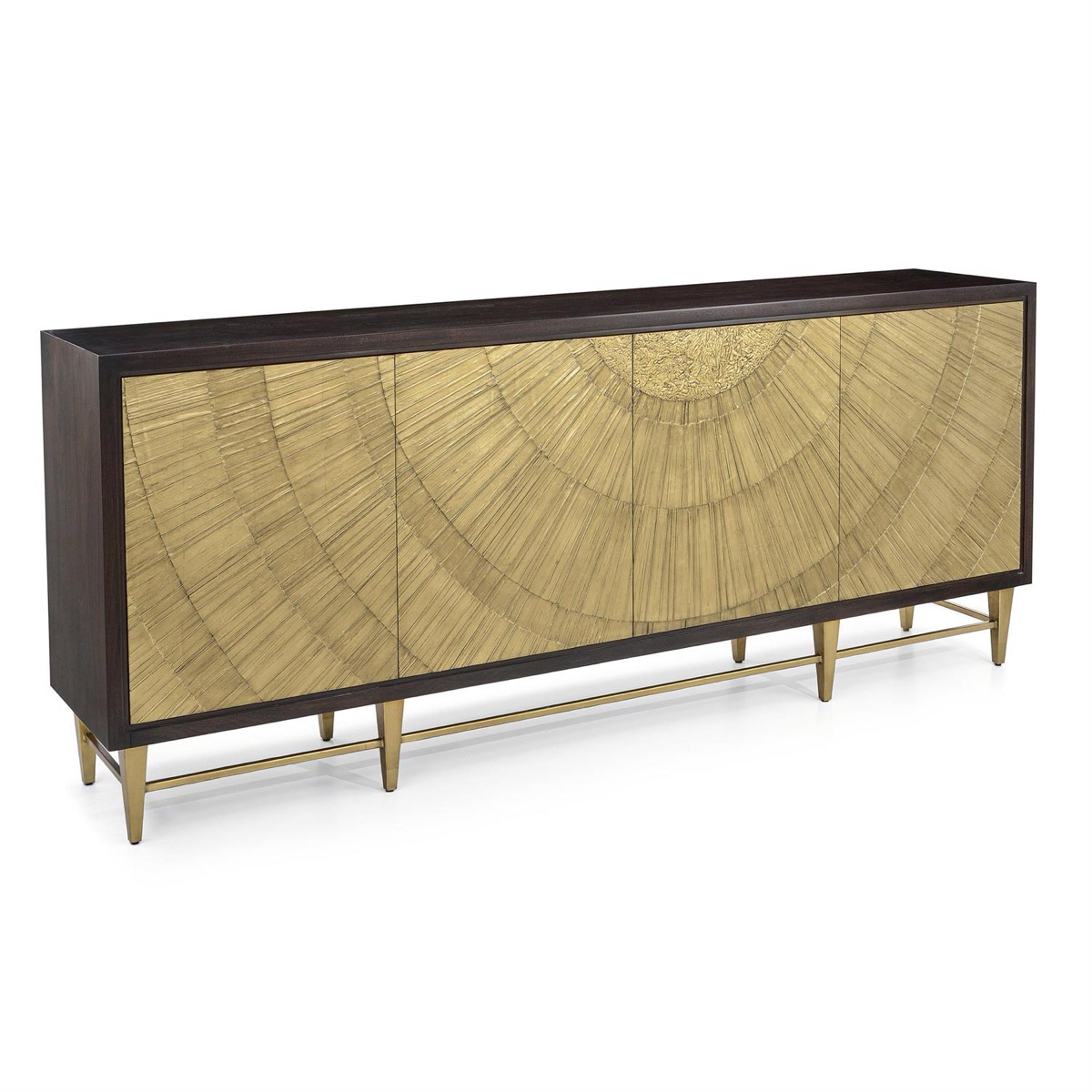 The Radiate four-door sideboard by John-Richard: a dark mahogany case on tapered brass legs, its doors gilded in a radiant sunrise pattern.