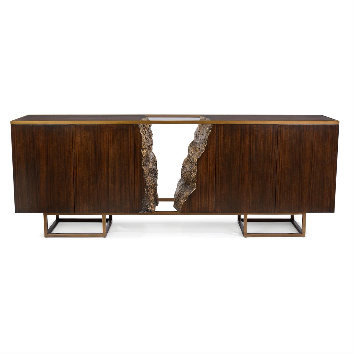 The Terra four-door credenza by John-Richard, a sculpted bronze fissure parting its dark ribbon-grain doors, over seven feet of dining-wall presence.