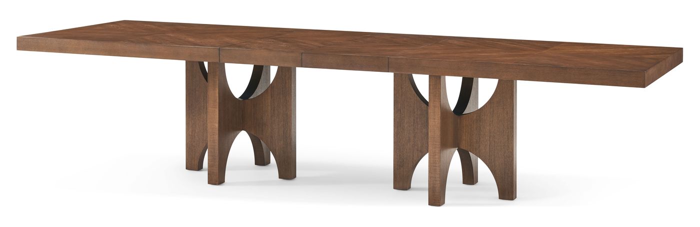 The Theodore Alexander Catalina extending dining table in ash, shown open with both leaves in place.
